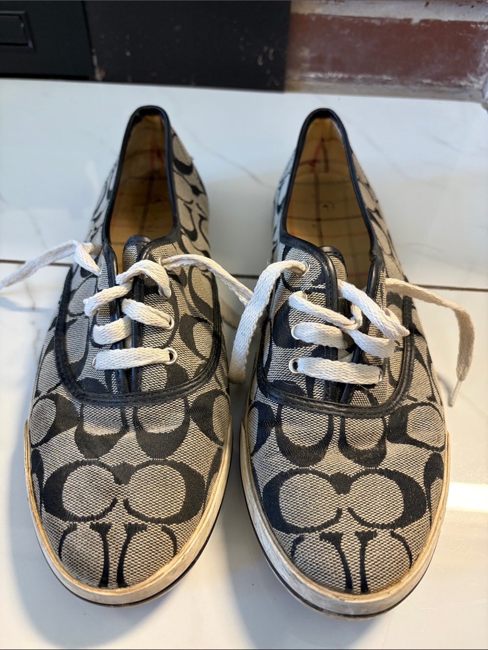 Coach Signature Canvas Lace-Up Sneakers in Black and Cream
